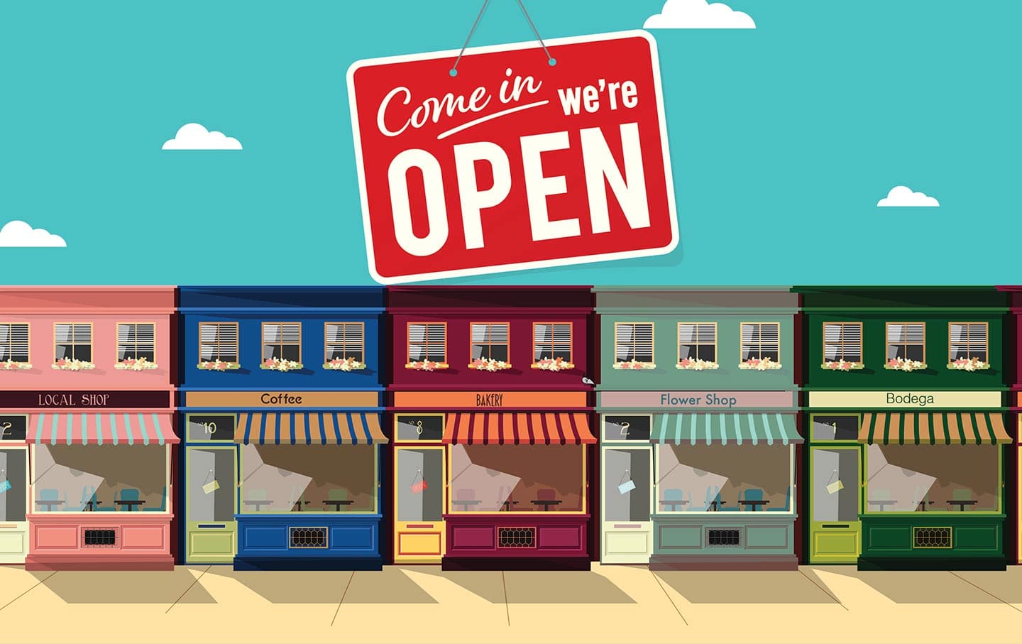 An open sign hanging in the window of a small independent shop